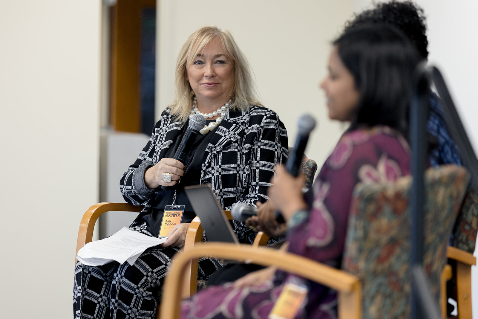 Counterpart President and CEO Dr. Ann Hudock moderates a panel at the University of Dayton Human Rights Conference in November 2023.